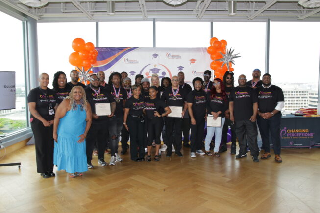 Changing Perceptions participants, staff, and community members celebrate together during the program’s comprehensive case management completion ceremony, recognizing the progress and achievements of returning citizens.